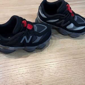 New Balance Kids Black and Gray Sneakers with Red Accents